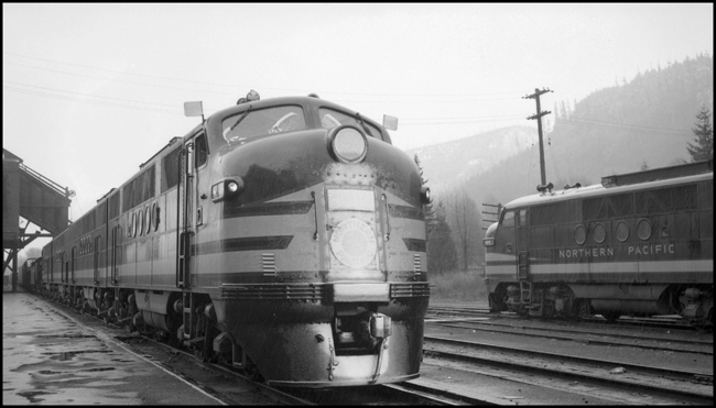 NP freight X6008W with new FT diesel passes diesel 6003, Lester, WA.