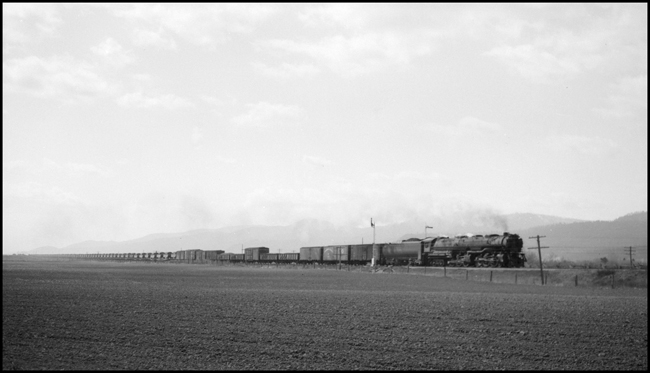 NP Class Z-6, 5117 handles a extra freight train westbound between Gaspard and Frenchtown, Montana.