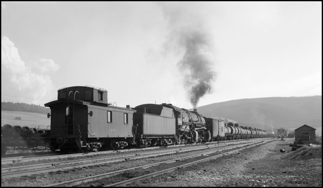 NP X5125W with caboose cut in behind helper near Blossburg, MT.  NP 5125 is a Class Z-7.