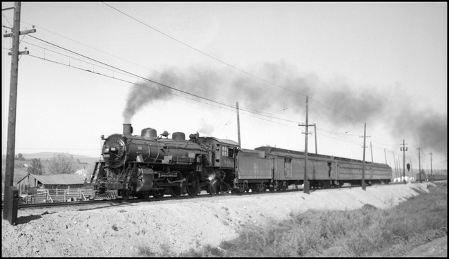 MILW Train No. 8 with MILW 848 moving passengers at Gold Creek, MT.