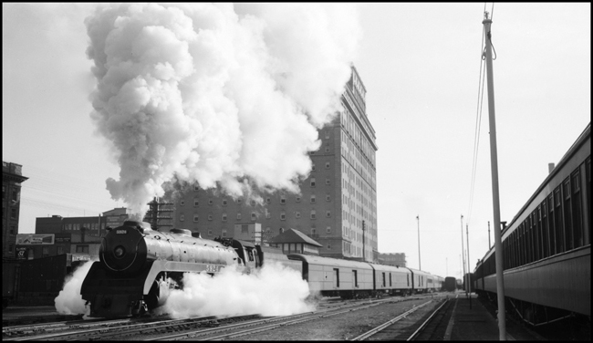 Canadian Pacific train No. 3, powered by 2-10-4 no. 5924, leaves Calgary, Alberta.