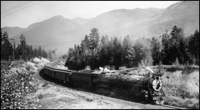 NP First No. 2, powered by NP 2665, Class A-3, a  4-8-4 locomotive near Schley, Montana 