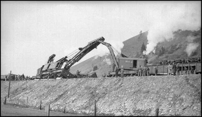 NP wrecker 47, overturned just east of Missoula. Wrecker  47 had been called to pick up a derailed gondola just east of Missoula, but insufficient blocking of wrecker 47 caused it to tip over onto the gondola. A small wrecker from the Missoula car shop assisted wrecker 27 in picking up wrecker 47. Wreckers 45 and 47, new 250-ton 