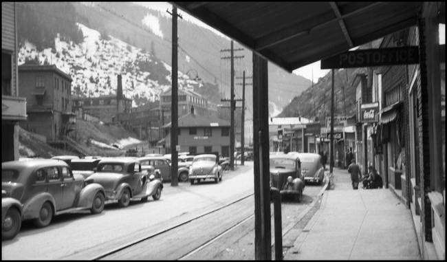 Street scene in Burke, Idaho. Union Pacific track extends along street.