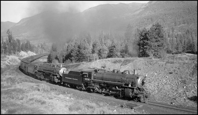 NP 2232, Class Q-5, Engr C. Wilson, and NP 2610, Class A, Engr Dickman, double heading on NP Train No. 2 just west of Evaro