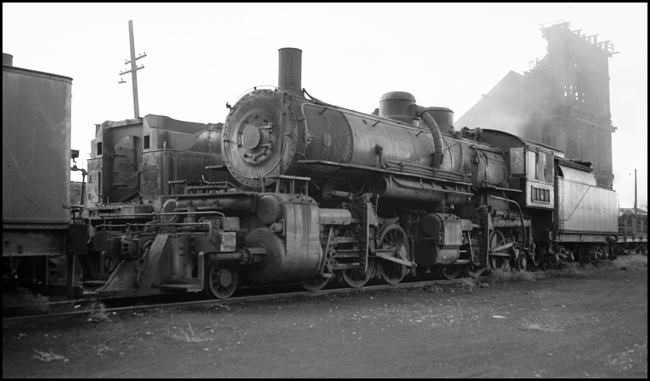 NP 3102, Class Z, in storage with windows boarded in Missoula yard.