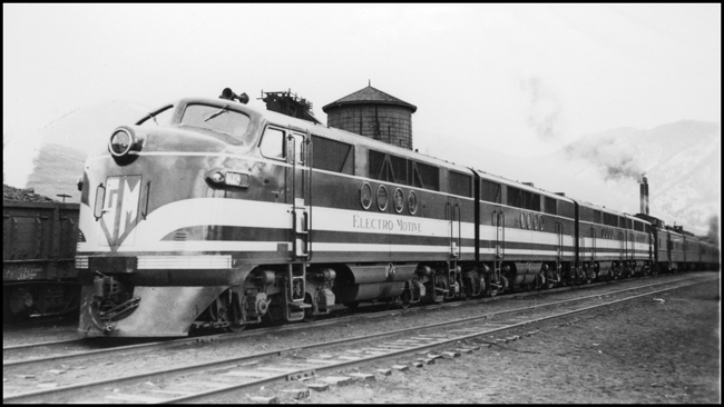 NP Train No. 603 powered by Electro Motive 103, experimental diesel electric locomotive arrives Missoula on test run from Northtown to Auburn. NP Dynamometer Car behind locomotive 