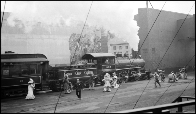 NYC&HR 999 steam locomotive crosses stage at the 