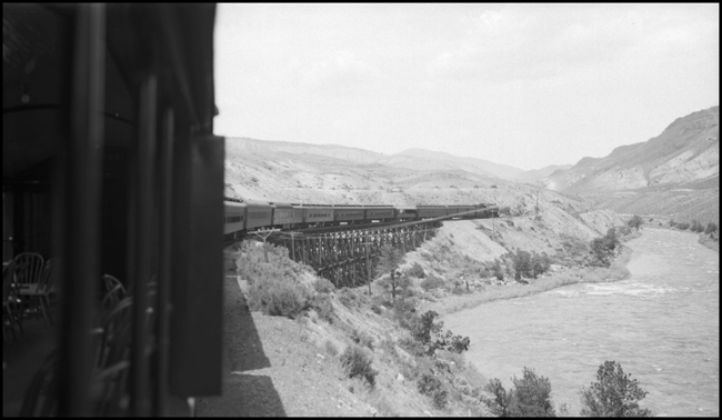 NP Psgr X1522E heading to Livingston from rear of train, just north of Gardiner, MT.  Yellowstone river visible on right side of train.