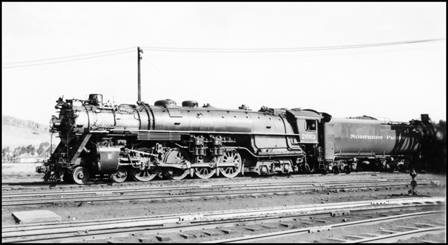 NP 2663, Class A-3 locomotive stopped at west end of Livingston yard, near 5th Street Crossing, probably waiting to be added to a west bound passenger train.