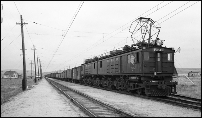 MILW X freight E, powered by electric locomotive E-53  east of Ringling, MT.