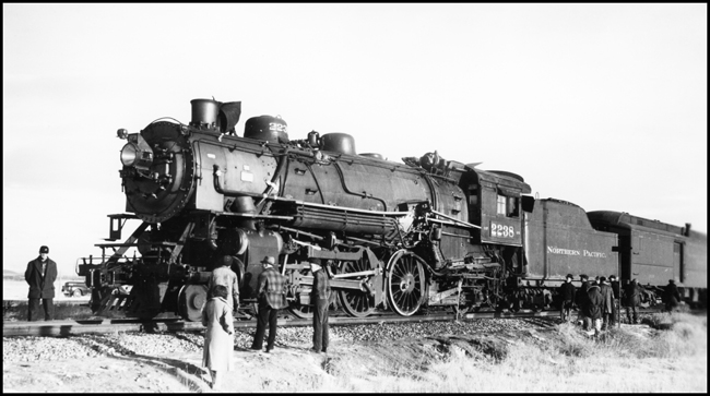 NP 2238, Class Q-5 locomotive with puncture in boiler and firebox caused by broken side rod.  Engr J Jondrow and Fmn Baxter were fatally injured after being sprayed with live steam and fire and then jumping from the moving engine.  Train ran one mile after side rod broke.