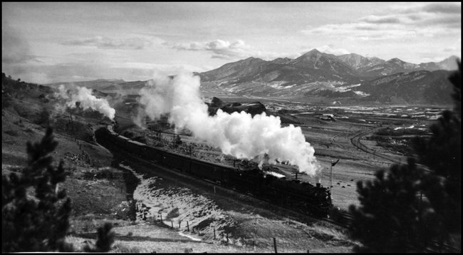 NP 2650, helped by NP 2652, both Class A-2 locomotives moving train 1st No. 1, up Bozeman Hill after leaving Livingston.