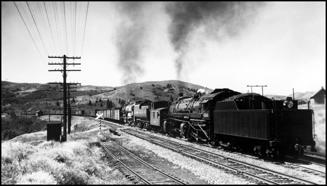 Two helpers on the rear of an XW at Muir.  NP 5101, Class Z-6 is ahead of the caboose and NP 4501 Class Z-4 is shoving behind the caboose.
