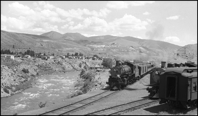 Some rearranging of a train is underwaybefore 218 can begin its run to Livingston.  1529, which will lead the train out of town, is tucked out of the way.  2152 is being uncoupled from the train and will move forward to allow 1529 to back down and recouple.