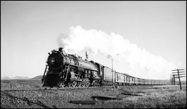 The westbound North Coast Limited moved from one block to another, as indicated by the guardian semaphores.  The power today is the one month old A-4 Northern, 2672.