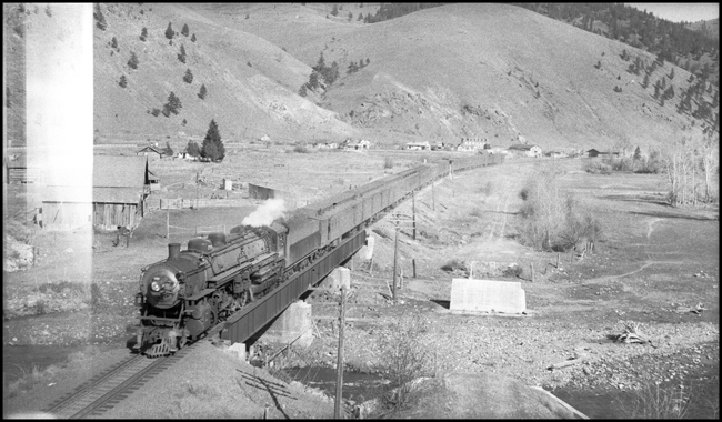 NP Train No. 1, with NP 2601, Class A locomotive crossing bridge near Ravalli, MT.