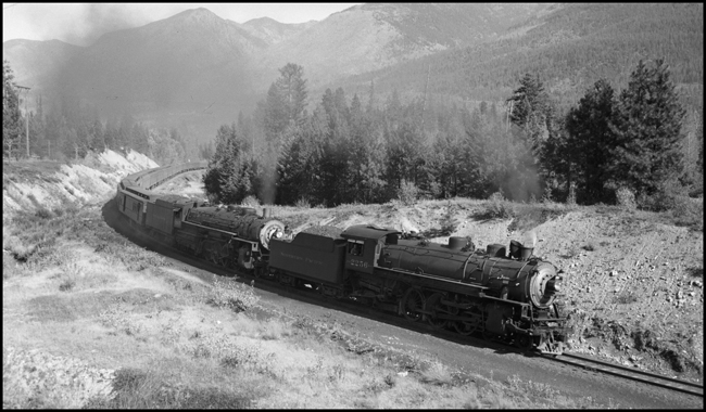 NP Train No. 2 doubled headed by NP 2256, Class Q-6, engineer Kenneth and NP 2607, Class A, Engineer Wilkins possibly in the area of Bonner