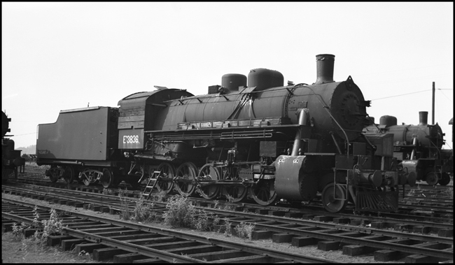 USSR 3836 , 2-10-0 steam locomotive in Portland, OR boarded up for possible shipping to USSR, w/o tender.