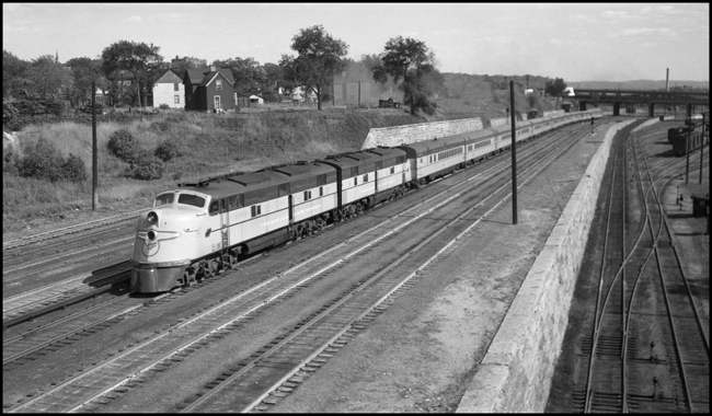 CNW No. 400 pulled by diesel electric locomotives CNW 5005 at St Paul, MN