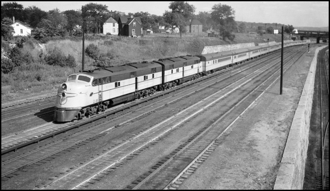 CNW No. 400 pulled by diesel electric locomotives CNW 5005 at St Paul, MN