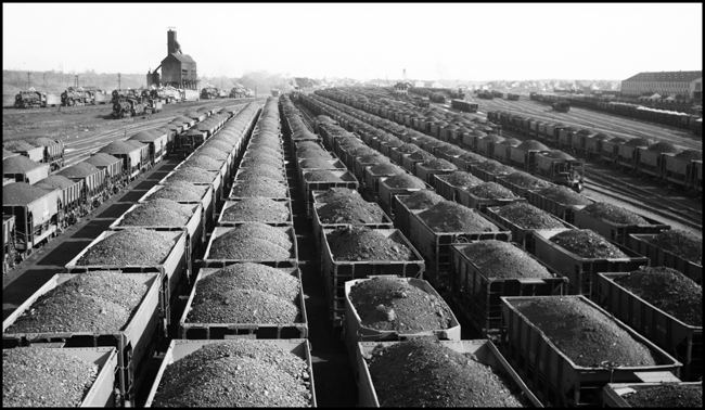 Duluth Minnesota and Iron Range RR Yard in Proctor, MN with lots of loaded ore cars full of iron ore.
