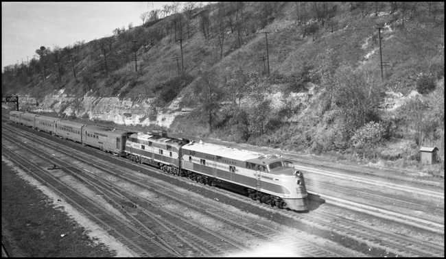 Rock Island Rocket passenger train passes by Dayton's Bluff as it leaves sty Paul, MN