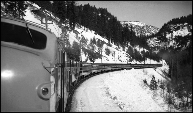GN Ex EB near Merritt, WA  2-17-47  View taken by Nixon from helper 5016, looking back at the train.  Note that Nixon got the entire train into this exceptional photo.