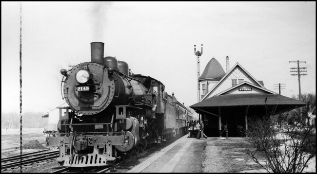 NP Train No. 61, with NP 2149, Class Q-3 at depot in Wyoming, MN 