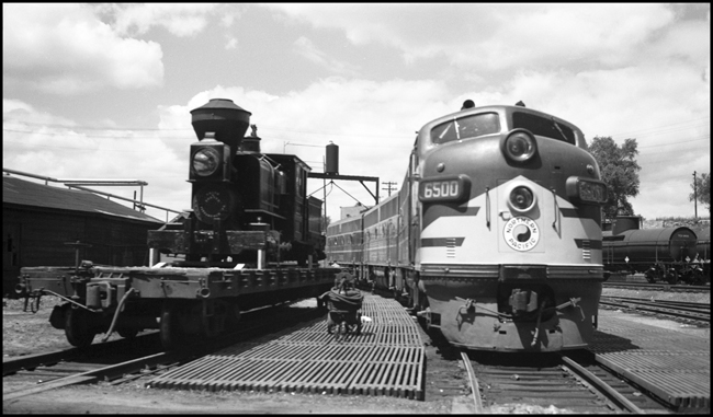 The Minnetonka is one of NP's few named locomotives,  and is en route to the Chicago Railroad Fair.  It is one of four locomotives used in the construction of the NP in the 19th century, spending most of its time on the west end of the line.  It is generally regarded to be NP's first locomotive, and has been preserved and cosmetically restored.  The cataloger thinks it is at the Lake Superior Transportation Museum in Duluth, MN.    NP took delivery of its first passenger F3, 6500, from EMD in January of 1947.  It is the latest word in NP power, shown here in juxtaposition with the first word of NP power.