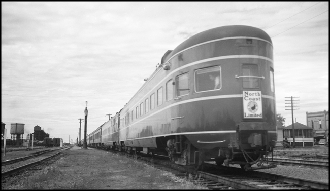 Rear end of NP 1, NCL, at Staples, MN, showing streamlined observation car.