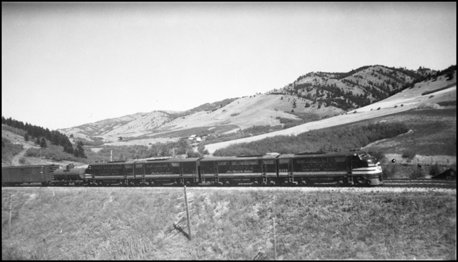 NP FT diesel 6008 on X6008E at Muir, MT, with mountains in background.
