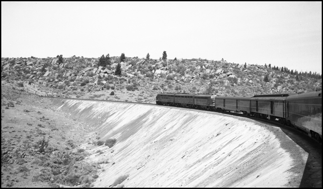 Looking forward from vestibule aboard NP No. 1, westbound NCL, Pipestone, MT.