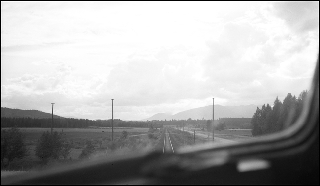 Scenic view through first-generation diesel windshield near Hope, ID