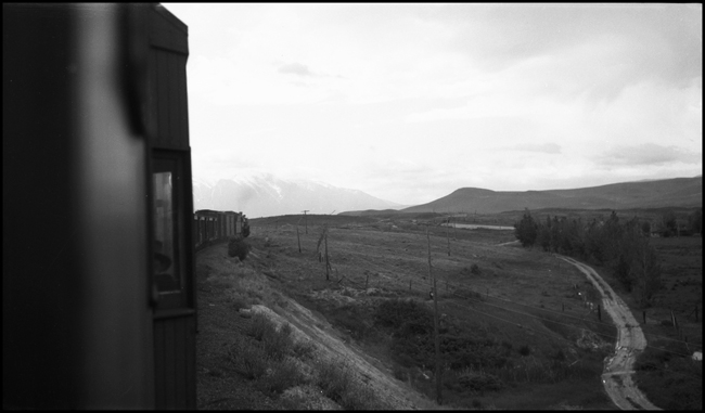 NP 1760, 2-8-2 Mikado Class W-3, with an extra freight train as seen from the caboose near Moiese, MT.