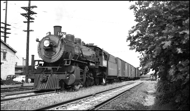 NP 1685, a 2-8-2 Mikado Class W-1, pulls an extra east bound freight train at Tacoma.