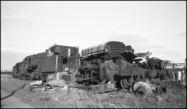 Scrapped Spokane International Railroad steam locomotives at Spokane, WA.