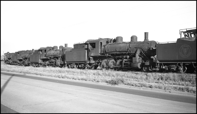 Scrapped Spokane International Railroad steam locomotives at Spokane, WA.