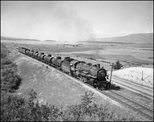 NP 1760, a 2-8-2 Mikado Class W-3, heads a short freight train, which is also train No. 844, at Polson, Montana.