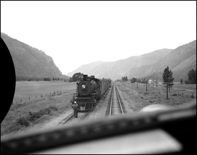 Cab view of west bound NP 1592, a 2-8-2 Mikado Class W, with an extra freight train at Weeksville, Montana.