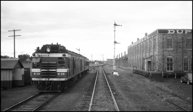 NP B16, an EMC RPO and baggage motor car.  It had been converted from gasoline to Diesel in 1949.  This Train No. 58 is the B&I Express between Staples and Duluth via Brainerd.