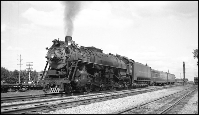 NP 2681, a 4-8-4 Northern Class A-5, leads a second train No. 2, NCL, through Dilworth, Minnesota.