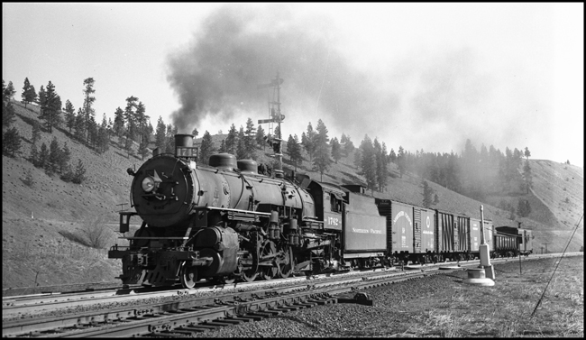 NP 1742, a 2-8-2 Mikado Class W-3, is west bound with an extra freight train at Marshall, Washington.