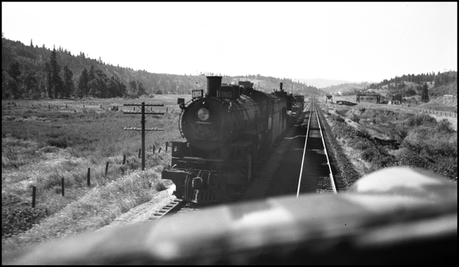 A cab view of NP 1905, a 2-8-2 Mikado Class W-2 ALCO (former NP 1555) with a short east bound extra freight train near Thorpe, WA.