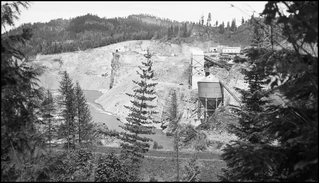 The NP right of way passing the construction site of Cabinet Dam across Cabinet Gorge in Cabinet, Idaho.