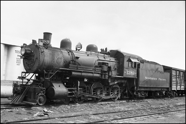 NP 1389 a 4-6-0 10-Wheeler Class S-4, with a freight train at Manhattan, MT.