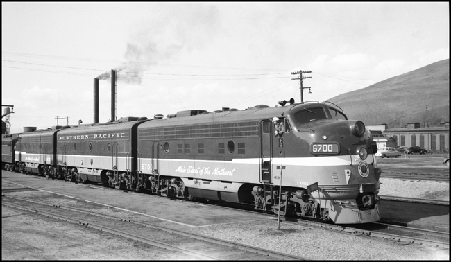 NP 6700A, F-9A, with B & C units at Missoula, MT.  Engineer looking to rear of train.