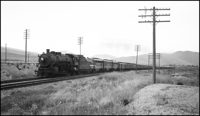 NP 1811 Class W-3, 2-8-2, with three diesel helpers Train #1, NCL, between Missoula and DeSmet, MT.