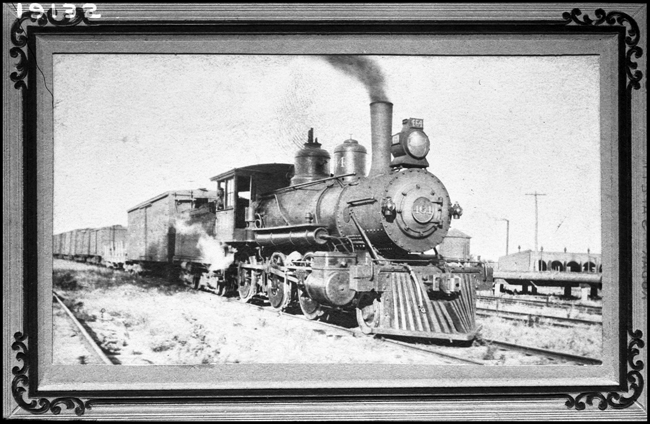 This is a photograph of a photograph that has been framed showing NP 464, Class D-3 Mogel, that was formerly numbered NP 530.  NP 464 was disposed of by 1//1/1927. 