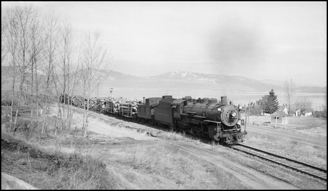 NP X1719W with NP 1719, Class W-3 pulling logs on the front end of a freight near Polson, MT. (2nd Trip for the day.)